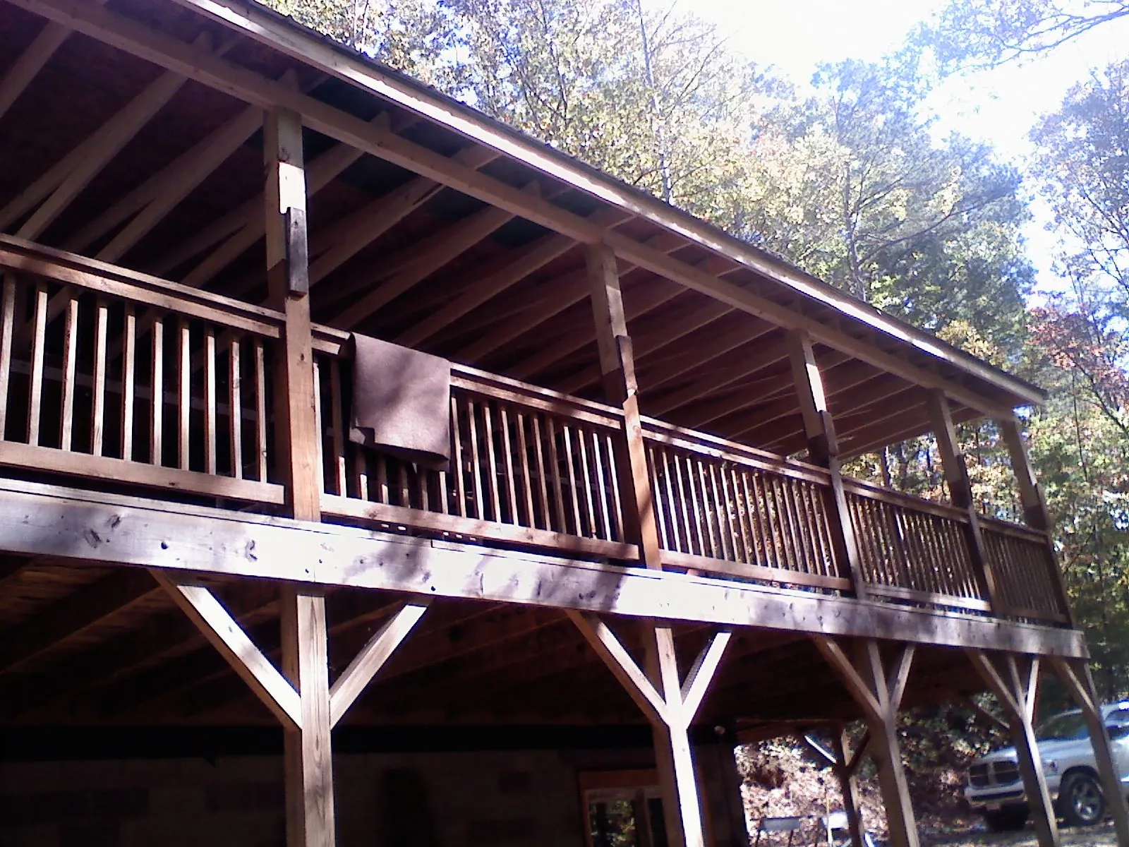 Timber framing under a new elevated porch and deck — Roof Leak Repair in Mason City by Roofing Brothers